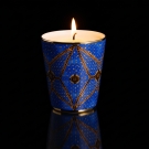 Pot à bougie Les Mille et Une Nuits allumé, décor de chaînes et losanges