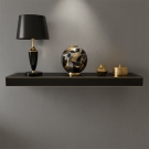 Boule Platinium en émaux de Longwy, décor noir, or et platine sur une luxueuse étagère