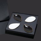 Coffret de 4 assiettes pétale Alizée Lorenza Di Filippo, porcelaine noire et blanche, luxe, filet or